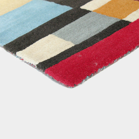  Close-up texture of Brink & Campman Estella Domino wool rug showing 1.7cm hand-tufted pile