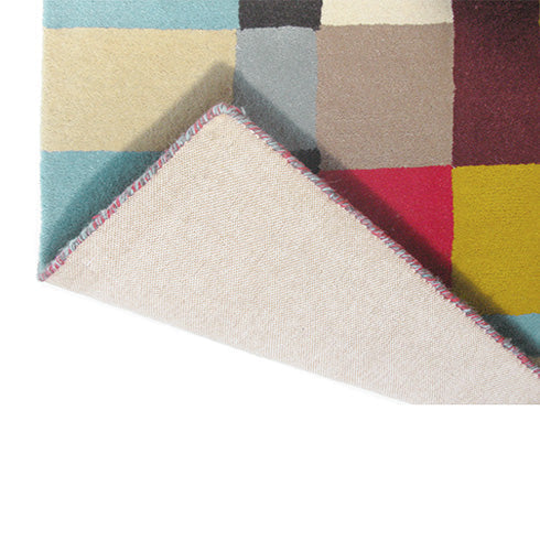  Detail edge of Brink & Campman Estella Domino hand-tufted wool rug