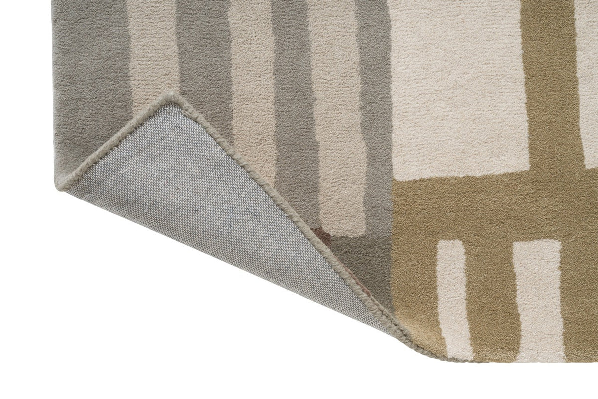 Harlequin Monolith Sandstone vloerkleed, detail van omgeslagen hoek en rug