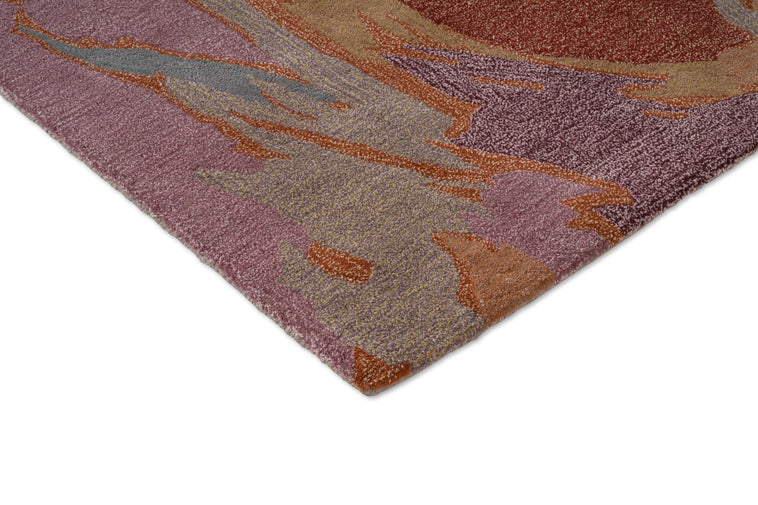 Harlequin Saltillo Rosewood vloerkleed, detail van hoek en pool