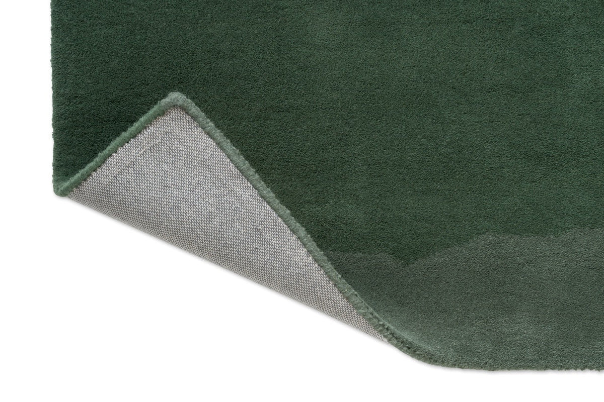 Harlequin Sedimentary Pine vloerkleed, detail van omgeslagen hoek en rug