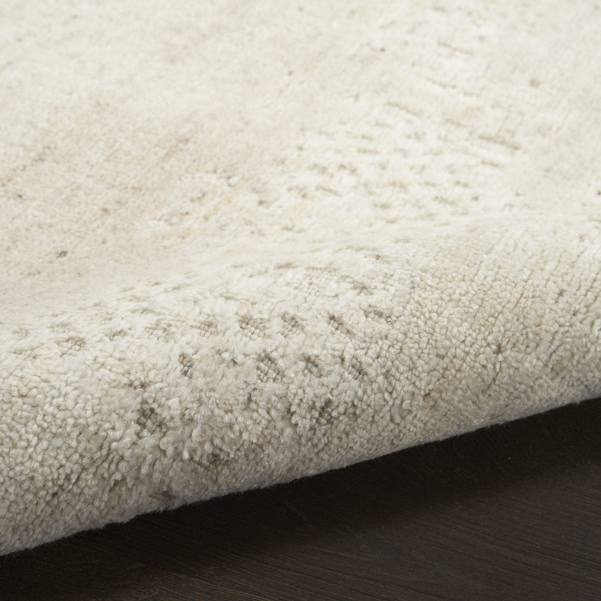 Nourison Harmony HAY07 Ivory ivoorwit vloerkleed, textuur van de pool
