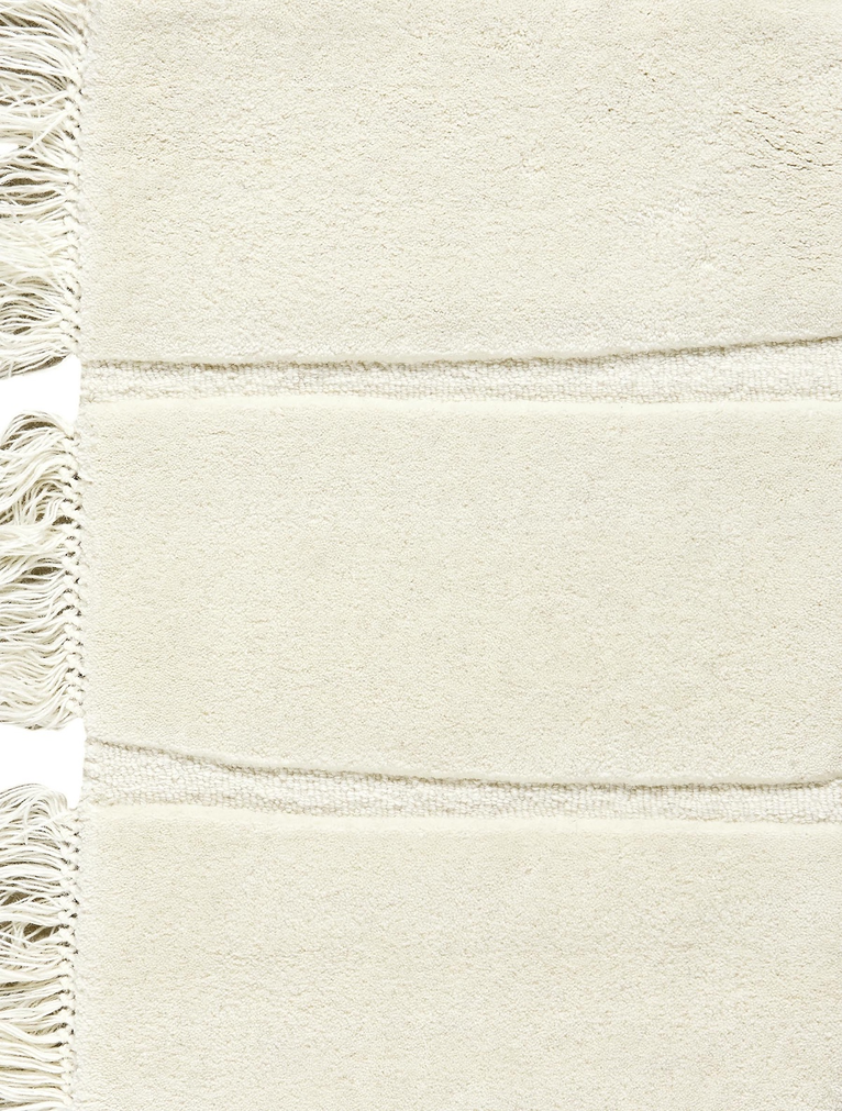 Massimo Atoll Cream handgetuft vloerkleed, detail van de franjes