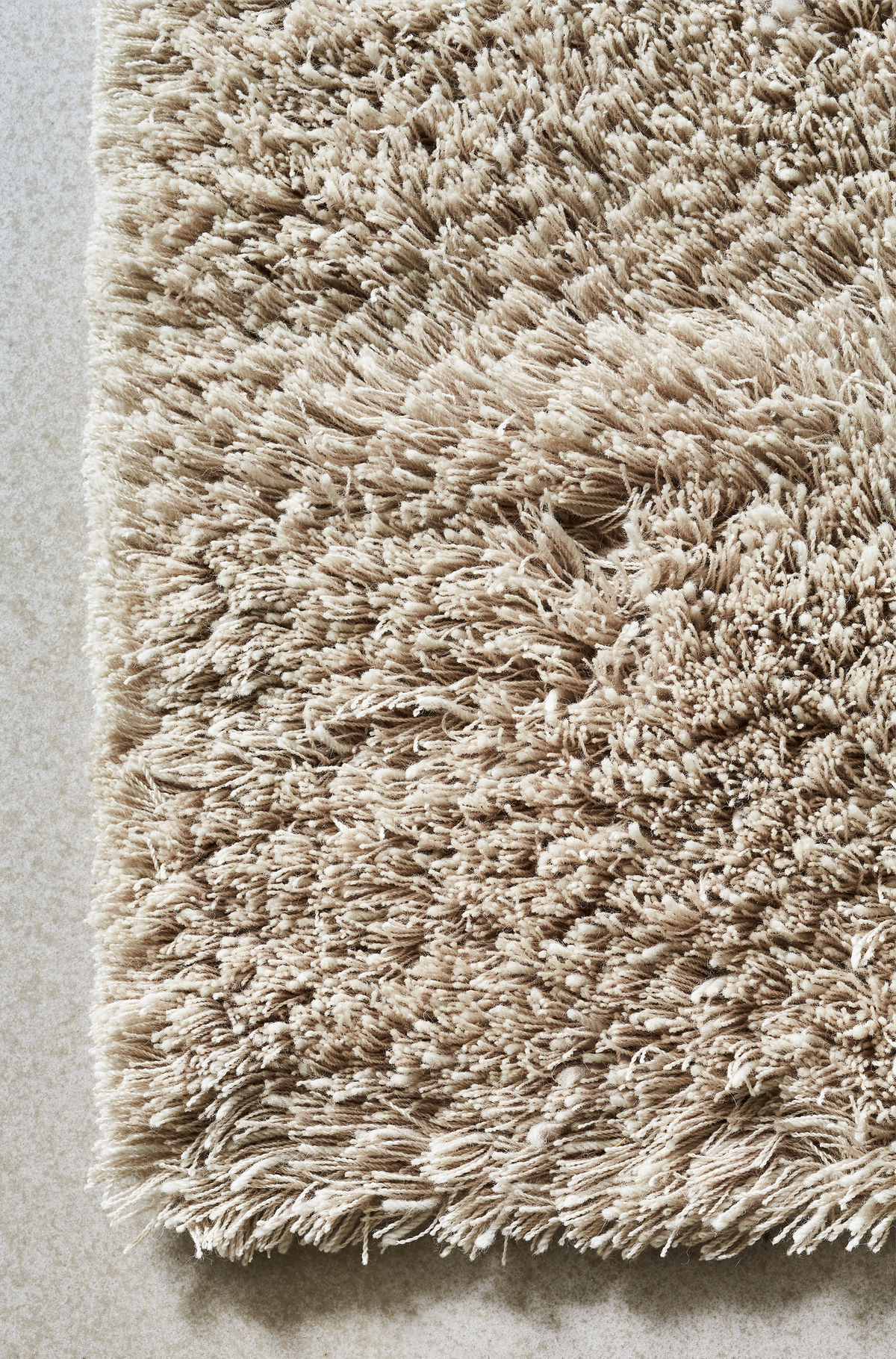 Massimo Rya Soft Beige hoogpolig vloerkleed, detail van de hoek
